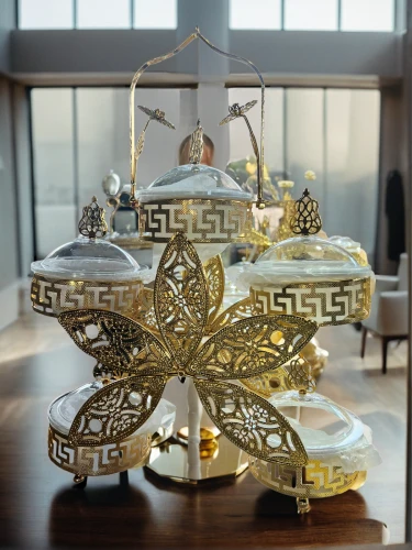 centrepiece,cake stand,tea service,tealight,chandelier,menorah,gold new years decoration,fragrance teapot,asian lamp,centerpiece,tureen,persian new year's table,gold foil tree of life,tea set,zoroastrian novruz,persian norooz,orrery,candle holder,bahraini gold,gold ornaments
