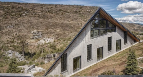 house in mountains,house in the mountains,cubic house,mountain hut,timber house,frame house,dunes house,inverted cottage,mirror house,the cabin in the mountains,eco-construction,eco hotel,cube house,slate roof,folding roof,mountain huts,modern architecture,metal cladding,alpine hut,mountain station,Architecture,Commercial Building,Modern,Elemental Architecture