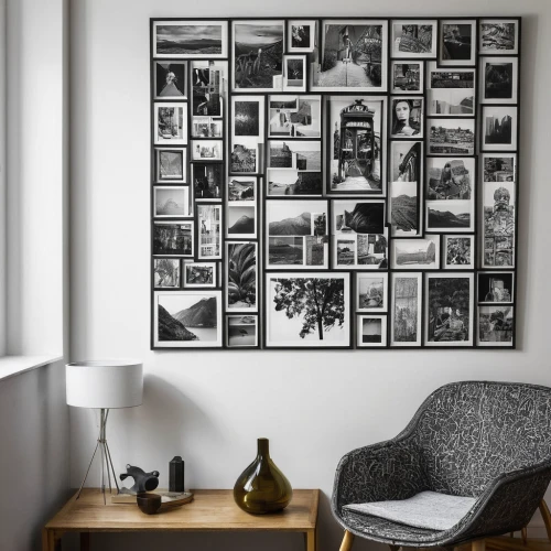 the living room of a photographer,wall decor,photo frames,modern decor,blank photo frames,wall decoration,picture frames,digital photo frame,cork board,monochrome photography,wall art,cork wall,slide canvas,contemporary decor,interior decor,shared apartment,framed paper,frame mockup,scandinavian style,photography studio,Photography,Black and white photography,Black and White Photography 11