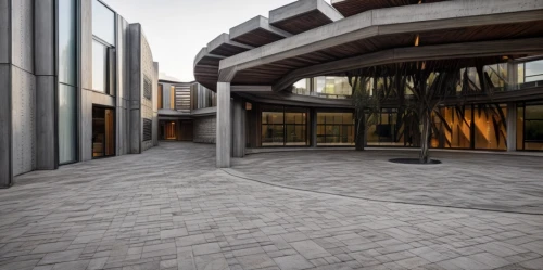 exposed concrete,driveway,glass facade,modern architecture,paved square,arq,courtyard,archidaily,paving stones,music conservatory,pavers,concrete slabs,wood deck,contemporary,walkway,dunes house,daylighting,house hevelius,metal cladding,concrete construction,Architecture,Villa Residence,Modern,Elemental Architecture