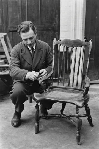 tailor seat,man on a bench,in seated position,man with a computer,men sitting,mobile device,sleeper chair,pipe smoking,shoeshine boy,bench chair,writing or drawing device,rocking chair,deckchair,cordwainer,reading magnifying glass,shoemaker,windsor chair,e-book readers,ondes martenot,portable communications device,Illustration,Paper based,Paper Based 29