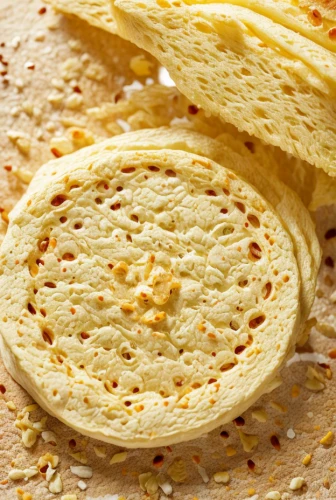 papadum,lefse,tortilla,roti,paratha,chapati,sel roti,roti prata,baleada,piadina,flat bread,naan,tortillas,semolina,corn tortilla,flatbread,parmesan wafers,pol roti,paratha roll,crêpe