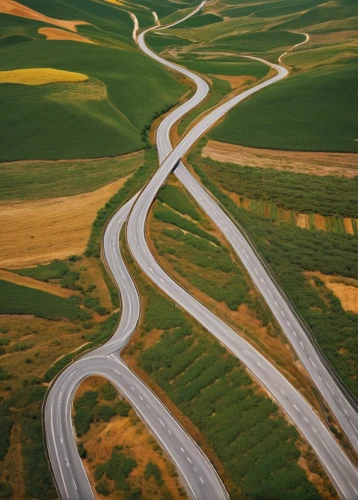 winding roads,winding road,polder,meanders,alcan highway,croatia a1 highway,roads,meander,rolling hills,mosel loop,highway,winding,landform,road to nowhere,long road,n1 route,dual carriageway,horsheshoe bend,pacific coast highway,braided river,Photography,Documentary Photography,Documentary Photography 35