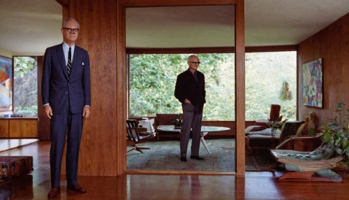 wooden mannequin,a wax dummy,standing man,stilts,mid century modern,tall man,mid century,stilt,display dummy,artist's mannequin,men's suit,mid century house,sculptor ed elliott,wooden figures,stand models,articulated manikin,proportions,elongated,walking stick,spy-glass,Conceptual Art,Oil color,Oil Color 12