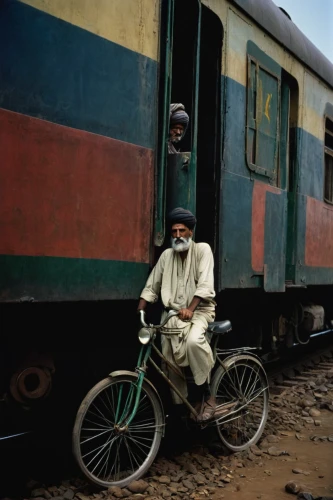 indian railway,india,train compartment,passenger train,railway system,red poppy on railway,central railway,express train,rack railway,rickshaw,wooden carriage,green train,train of thought,railway,lahore,transport,rail transport,nomadic people,railway axis,long-distance train,Photography,Documentary Photography,Documentary Photography 07