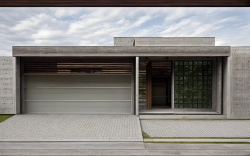 garage door,concrete ceiling,exposed concrete,dunes house,japanese architecture,residential house,concrete blocks,concrete construction,archidaily,folding roof,concrete,garage,cubic house,stucco wall,modern house,frame house,stucco frame,driveway,roller shutter,concrete wall,Architecture,Villa Residence,Modern,Elemental Architecture