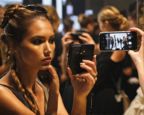 woman holding a smartphone,applying make-up,beauty shows,taking photos,doll looking in mirror,paparazzi,makeup mirror,artificial hair integrations,taking photo,on the phone,in the mirror,video phone,mirror,photographing,updo,a girl with a camera,backstage,chignon,mirrorless interchangeable-lens camera,mobile phone case,Illustration,Retro,Retro 03