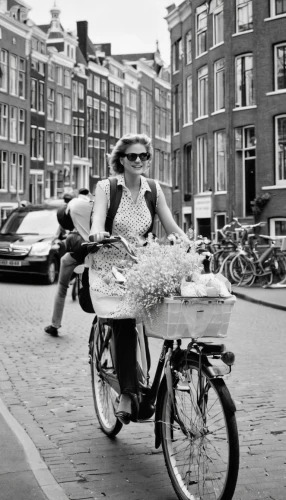 woman bicycle,woman with ice-cream,newspaper delivery,amsterdam,city bike,floral bike,flower delivery,bicycle ride,dutch,bicycle riding,delivery man,flower cart,girl in a historic way,cyclist,courier,courier driver,bicycling,bikejoring,cycling,bicycles,Photography,Black and white photography,Black and White Photography 06