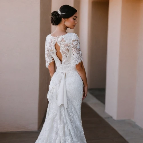 bridal dress,wedding gown,wedding dresses,wedding dress,bridal clothing,wedding dress train,bridal party dress,bridal,back view,ball gown,quinceanera dresses,lace border,bridal veil,walking down the aisle,girl in a long dress from the back,royal lace,bridal accessory,blonde in wedding dress,bridal jewelry,bride,Photography,Fashion Photography,Fashion Photography 09