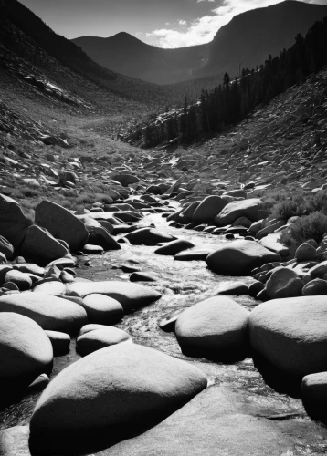 braided river,stream bed,mountain stone edge,smooth stones,alluvial fan,stacked stones,balanced pebbles,soapstone,mountain stream,mountain river,boulders,flowing creek,fallen giants valley,sandstones,stacked rock,massage stones,moonscape,zen rocks,stone desert,monochrome photography,Illustration,Black and White,Black and White 33
