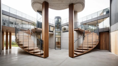 circular staircase,winding staircase,outside staircase,spiral staircase,wooden stair railing,wooden stairs,staircase,spiral stairs,steel stairs,the threshold of the house,stairwell,wood mirror,stair,revolving door,archidaily,dunes house,stairs,winding steps,mirror house,house entrance,Architecture,General,Masterpiece,Minimalist Modernism