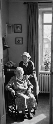 old couple,rear window,nursing home,blonde woman reading a newspaper,vintage man and woman,elderly person,grandparents,vintage 1951-1952 vintage,1940 women,pensioner,elderly man,elderly people,old age,pensioners,people reading newspaper,elderly lady,hospital bed,care for the elderly,woman on bed,man and wife,Photography,Black and white photography,Black and White Photography 10