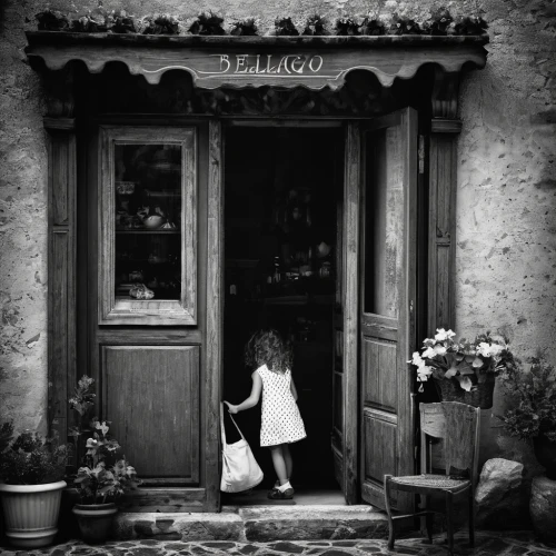 little girl reading,provencal life,dordogne,vintage boy and girl,little girl in wind,photographing children,little girl with umbrella,open door,in the door,girl picking flowers,little girl with balloons,the little girl,vintage children,arles,girl in the kitchen,provence,the little girl's room,the threshold of the house,little boy and girl,passepartout,Photography,Black and white photography,Black and White Photography 02