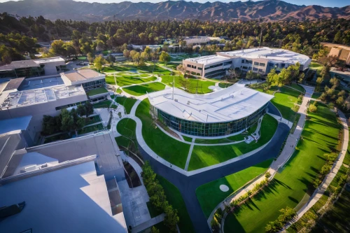 home of apple,performing arts center,stanford university,futuristic art museum,music conservatory,biotechnology research institute,drone image,view from above,futuristic architecture,indian canyons golf resort,business school,north american fraternity and sorority housing,bird's-eye view,the golf valley,california academy of sciences,solar cell base,building valley,getty centre,campus,drone photo,Photography,Documentary Photography,Documentary Photography 25