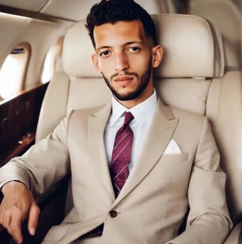 business jet,men's suit,navy suit,a black man on a suit,businessman,emirates,wedding suit,ceo,business man,yemeni,suit,african businessman,black businessman,billionaire,abdel rahman,suit actor,aristocrat,formal guy,corporate jet,flight attendant