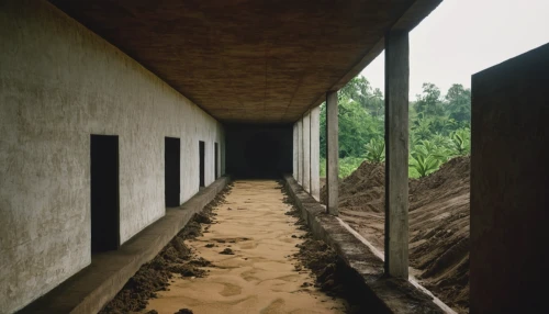 mud wall,corridor,dugout,exposed concrete,hallway,concrete construction,compound wall,walkway,clay floor,structural plaster,soil erosion,the threshold of the house,eco-construction,reinforced concrete,lecture hall,concrete ceiling,underpass,clay house,rwanda,hallway space,Photography,Documentary Photography,Documentary Photography 15