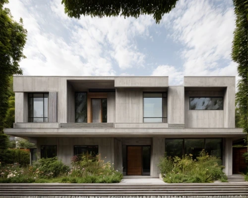 modern house,modern architecture,dunes house,cubic house,residential house,exposed concrete,cube house,garden elevation,house shape,residential,two story house,contemporary,frame house,concrete construction,concrete,stucco frame,stucco,concrete blocks,stucco wall,archidaily,Architecture,Villa Residence,Modern,Elemental Architecture