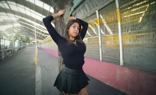 street dancer,hip-hop dance,street dance,the girl at the station,dance,twirling,blurred vision,video clip,woman pointing,tricking,dancing,love dance,blurred,concrete background,photo shooting,photo shoot with edit,pointing woman,motion,to dance,latin dance
