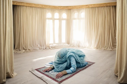 woman praying,praying woman,prayer rug,girl praying,conceptual photography,muslim woman,man praying,house of allah,empty room,girl in cloth,islamic girl,sleeping room,blue room,rem in arabian nights,a curtain,burqa,woman on bed,comforter,allah,hijaber