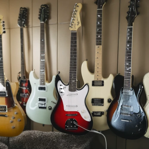 guitars,squier,fender,fender g-dec,epiphone,electric guitar,music instruments,instruments,guitar head,guitar bridge,guitar accessory,guitar,telecaster,guitar grips,guitar amplifier,an array of,the guitar,a family harmony,musical instruments,ibanez