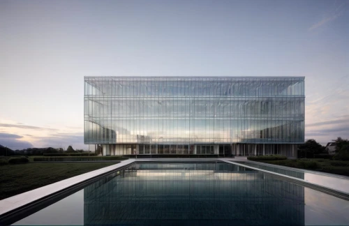 glass facade,archidaily,glass facades,glass building,structural glass,chancellery,glass wall,cube house,water cube,glass panes,aqua studio,kirrarchitecture,mclaren automotive,modern architecture,glass blocks,house hevelius,cubic house,arq,new building,mirror house
