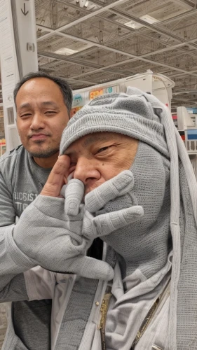 hear no evil,wrinkled potatoes,black friday social media post,shopping carts,homeless man,grocery shopping,coat hangers,children's shopping cart,trolleys,supermarket chiller,ski mask,guests,shopping trolleys,cot,salt and pepper,swaddle,flu,to laugh,zzz,nasal drops,Common,Common,None