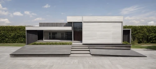 modern house,modern architecture,exposed concrete,cubic house,cube house,dunes house,concrete blocks,concrete slabs,house shape,contemporary,frame house,residential house,modern style,gunmetal,lago grey,concrete,stucco wall,danish house,flat roof,paving slabs,Architecture,Villa Residence,Modern,Italian International