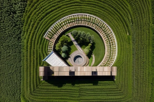 chair in field,semi circle arch,bed in the cornfield,dutch windmill,silo,fibonacci spiral,dovecote,field barn,corn field,maze,dji agriculture,aerial landscape,the center of symmetry,helix,three centered arch,drone image,stonehenge,round barn,barn,agriculture,Realistic,Landscapes,Verdant