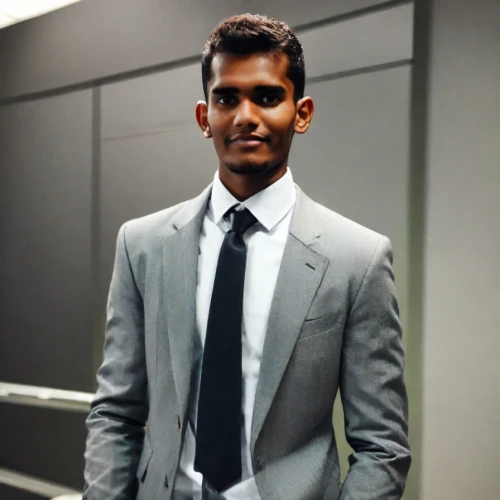 a black man on a suit,social,men's suit,mahendra singh dhoni,malaysia student,formal guy,maldivian rufiyaa,devikund,suit actor,navy suit,wedding suit,black businessman,silambam,sri lanka lkr,suit,suit trousers,white-collar worker,businessman,benagil,bangladeshi taka