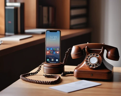 conference phone,viewphone,telephone handset,telephone accessory,handset,samsung galaxy,telephone hanging,old phone,ifa g5,landline,wireless charger,corded phone,communication device,telephony,lg magna,feature phone,samsung x,mobile phone,nokia hero,talk mobile