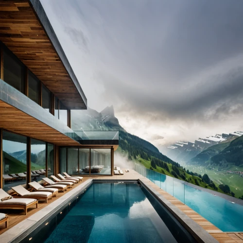 house in mountains,house in the mountains,roof landscape,infinity swimming pool,pool house,swiss house,luxury property,switzerland chf,mountain huts,the cabin in the mountains,modern architecture,grindelwald,outdoor pool,alpine style,roof top pool,chalet,modern house,home landscape,mountainside,southeast switzerland,Photography,General,Natural