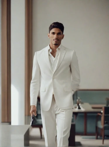 wedding suit,white clothing,white coat,men's suit,smooth criminal,the suit,commercial,mahendra singh dhoni,a black man on a suit,abdel rahman,indian celebrity,mohammed ali,formal guy,tuxedo just,kabir,white-collar worker,suit trousers,male model,the groom,white shirt
