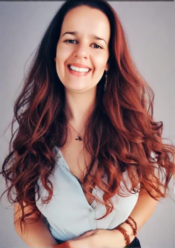 a girl's smile,artificial hair integrations,portrait background,killer smile,smiling,british semi-longhair,girl on a white background,social,redhair,laugh,a smile,beautiful young woman,cosmetic dentistry,smile,young woman,book,grin,edit icon,red-haired,romanian