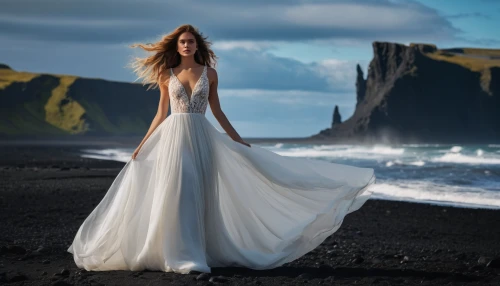 celtic woman,girl in a long dress,wedding gown,wedding dresses,black sand,bridal dress,wedding dress,bridal clothing,evening dress,wedding photography,passion photography,girl on the dune,girl in white dress,white winter dress,bridal party dress,blonde in wedding dress,long dress,portrait photography,girl in a long dress from the back,portrait photographers,Photography,General,Natural