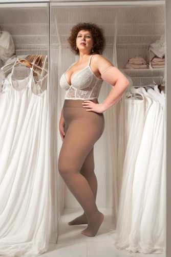 plus-size model,bridal clothing,plus-size,see-through clothing,women's clothing,crinoline,clotheshorse,display dummy,artist's mannequin,female model,girdle,one-piece garment,woman hanging clothes,brown fabric,fashion shoot,dress shop,plus-sized,women clothes,in pantyhose,garment