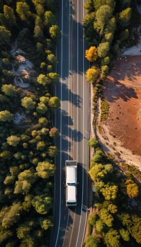 hume highway,aerial photography,mavic 2,dji spark,aerial landscape,roads,delivery trucks,tilt shift,road surface,commercial vehicle,highway roundabout,drone image,forest road,winding roads,vehicle transportation,drone shot,overhead shot,dji mavic drone,transport and traffic,mountain road,Photography,General,Natural