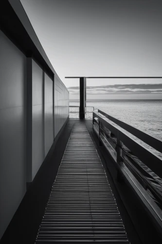 blackandwhitephotography,monochrome photography,walkway,dock,sliding door,spaciousness,wooden pier,board walk,decking,boardwalk,forms,wooden decking,jetty,bench by the sea,horizontal lines,railing,gray-scale,observation deck,sylt,the threshold of the house,Photography,Documentary Photography,Documentary Photography 14