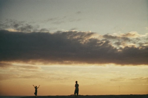 vintage couple silhouette,lubitel 2,two meters,silhouette against the sky,couple silhouette,silhouette of man,summer sky,film,against sky,silhouetted,silhouettes,before sunrise,cowboy silhouettes,loving couple sunrise,arms outstretched,graduate silhouettes,salt-flats,camera film,film roll,handstand,Photography,Documentary Photography,Documentary Photography 02