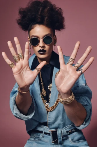 beatenberg,rockabella,afro-american,afroamerican,kontroller,align fingers,bjork,afro american girls,gold jewelry,artificial hair integrations,woman hands,afro american,gold rings,portrait background,lady pointing,afro,linkedin icon,hand drip,woman pointing,fierce,Photography,Fashion Photography,Fashion Photography 01