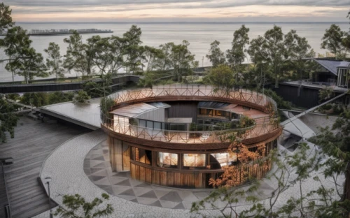 tree house hotel,dunes house,tree house,cubic house,treehouse,mirror house,cube house,house by the water,timber house,summer house,house of the sea,corten steel,eco hotel,roof garden,round hut,modern architecture,frame house,round house,stilt house,beach house