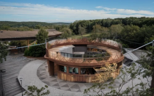 tree house hotel,eco hotel,wine barrel,circular staircase,dunes house,round house,corten steel,cubic house,jewelry（architecture）,tree house,wine barrels,observation tower,treehouse,bird's-eye view,archidaily,orrery,winery,modern architecture,cube house,thermae