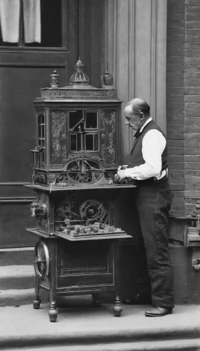 street organ,old calculating machine,organist,cash register,typing machine,reich cash register,typewriting,chiffonier,barrel organ,writing desk,mail clerk,the phonograph,old trading stock market,tinsmith,phonograph,watchmaker,clockmaker,cimbalom,the gramophone,man with a computer,Photography,Black and white photography,Black and White Photography 15