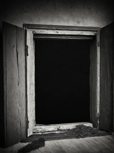 creepy doorway,dark cabinetry,the door,a dark room,open door,wooden door,doorway,darkroom,box camera,the threshold of the house,empty room,old door,wood window,in the door,home door,door,bannack,the window,empty space,monochrome photography,Photography,Documentary Photography,Documentary Photography 26