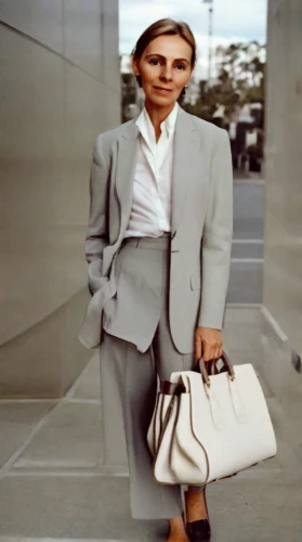 woman in menswear,businesswoman,business woman,briefcase,white-collar worker,birkin bag,business bag,eva saint marie-hollywood,businesswomen,business girl,business women,menswear for women,purse,bussiness woman,audrey hepburn-hollywood,satchel,handbag,businessperson,the style of the 80-ies,shoulder pads