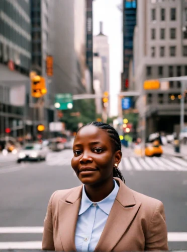 women in technology,new york streets,nigeria woman,ny,maria bayo,woman in menswear,white-collar worker,black professional,a pedestrian,marble collegiate,woman walking,an investor,bussiness woman,nyc,new york,sighetu marmatiei,businesswoman,woman holding a smartphone,sprint woman,harlem