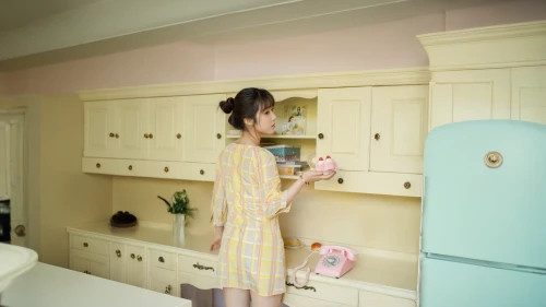 girl in the kitchen,vintage kitchen,doll kitchen,housework,cleaning woman,kitchen,kitchen cabinet,laundry room,pantry,kitchen design,kitchen interior,girl with cereal bowl,kitchenette,kitchen shop,cleaning service,housekeeper,housekeeping,housewife,big kitchen,star kitchen