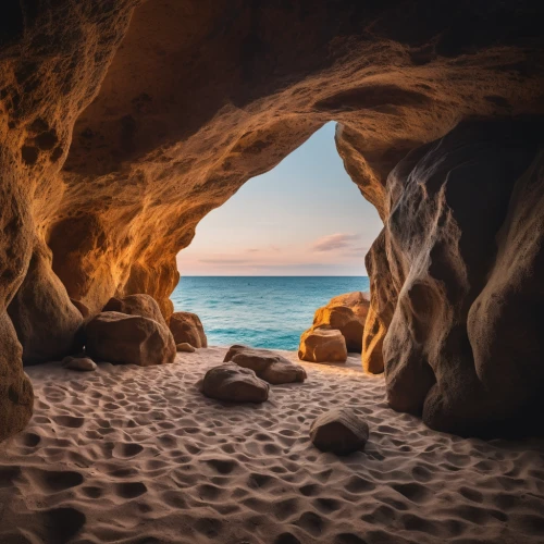 sea cave,sea caves,cliff dwelling,petra tou romiou,aphrodite's rock,natural arch,sandstone rocks,rock arch,cave on the water,sardinia,beach landscape,rock erosion,south australia,algarve,landscape photography,seascapes,sand coast,erosion,coastal landscape,rock formation,Photography,General,Cinematic