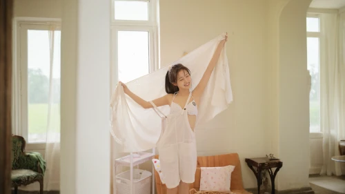 mosquito net,canopy bed,drapes,four poster,woman hanging clothes,window curtain,airy,window valance,a curtain,raw silk,laundress,bamboo curtain,four-poster,nightgown,linens,overskirt,curtain,hanging chair,white silk,window treatment