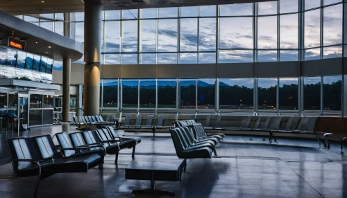 airport terminal,airport,dulles,lobby,terminal,empty interior,glass wall,seating area,waiting room,baggage hall,glass panes,window film,berlin brandenburg airport,airport apron,daylighting,blue hour,queue area,hof-plauen airport,station concourse,deserted,Photography,Documentary Photography,Documentary Photography 19