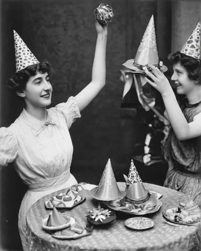 party hats,celebration of witches,witches' hats,party hat,throwing hats,fête,tea party,toasting,twenties women,celebrate,birthdays,birthday party,ball fortune tellers,cake stand,a party,celebrating,witches,hatmaking,1920s,prohibition,Photography,Black and white photography,Black and White Photography 15